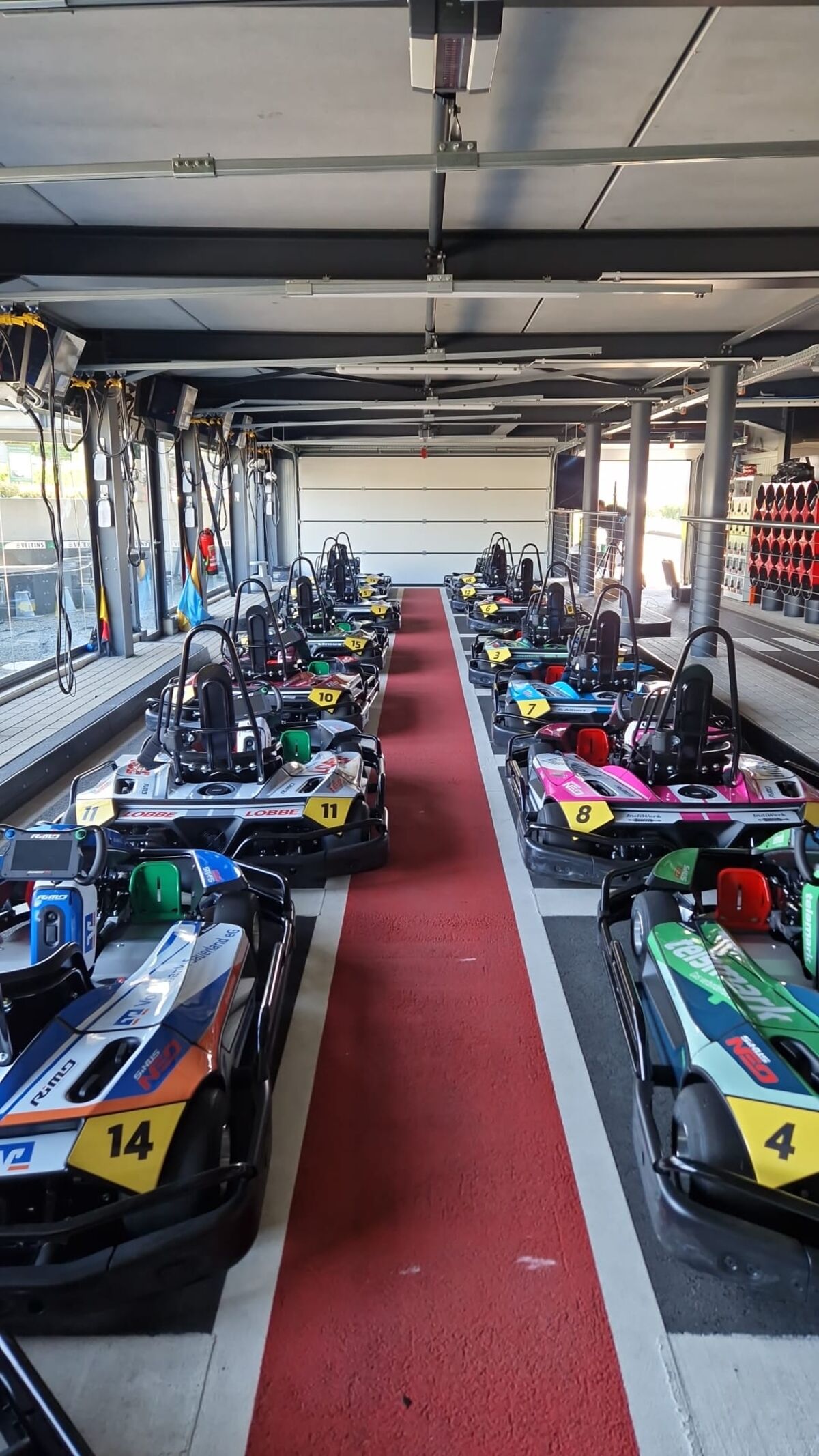 A venue's existing electric kart fleet in the garage